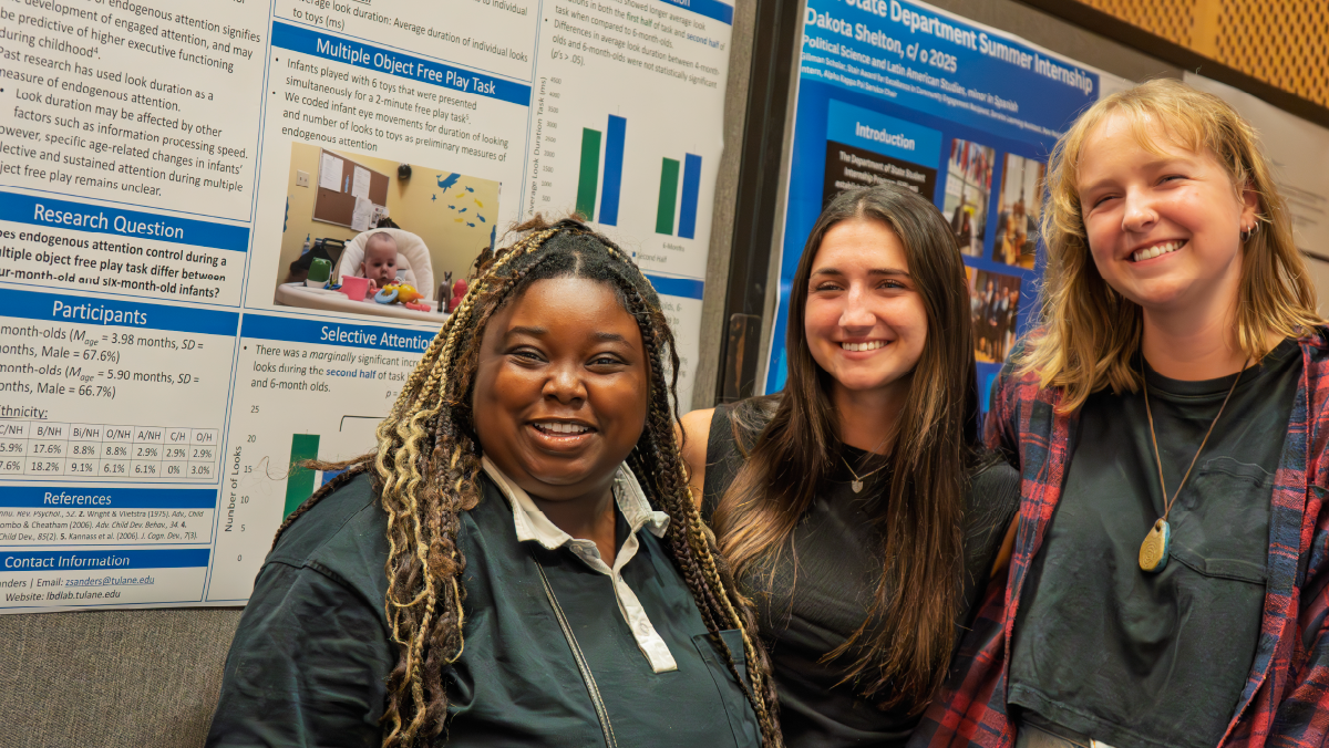 Student presenting research poster