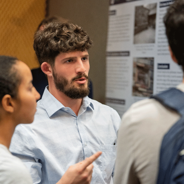 Student Showing Research poster